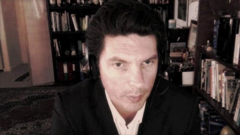 SENATOR Scott LUDLAM goes to the aide of Julian ASSANGE