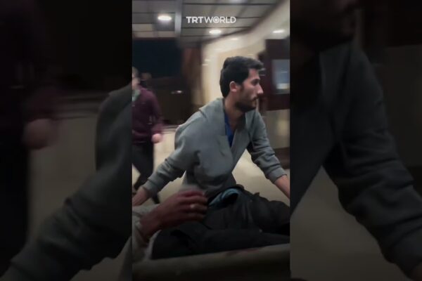 Palestinian doctor and civilians risk lives saving injured man in Gaza